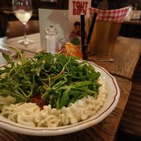 Vegan pasta underneath the sauce. at Bavet - Nationalestraat in Antwerpen