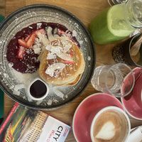 Protein pancakes, green juice and vegan cappuccino   at Zina's Eatery in Vienna