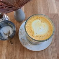 Homemade Golden Milk with soy milk at Zina's Eatery in Vienna