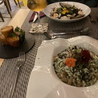 Vegan risotto and sweet potato side. Non vegan option at the back.  at Gavino Restaurante Bar in Funchal