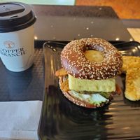 Breakfast sandwich & coffee at Copper Branch in Oakville