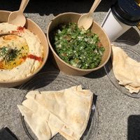 Hummus salad tabboule and pita   at Moses Cafe in Graz