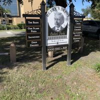 Sign in front of building  at Dharma Southern Kitchen in Sanford