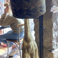 genuinely love this giraf lamp its so friend  at Penny Lane Cafe in Aalborg