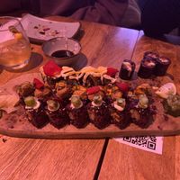 Our board of different sushi options already half smashed   at Vegan Sushi Bar - Downtown in Amsterdam