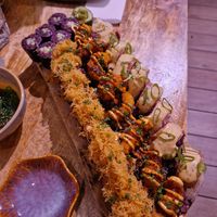 Flambee salmon, shrimp tempura and tuna rolls at Vegan Sushi Bar - Downtown in Amsterdam