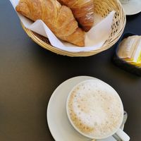 Vegan croissant and cappuccino at Comis Ice Cafe in Catania