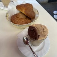 Hazelnut and dark chocolate granita and vegan brioche   at Comis Ice Cafe in Catania