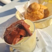 Modica chocolate and pistacho granita (naturally vegan) with vegan brioscia at Comis Ice Cafe in Catania