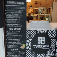 Sales window with menu at Tapiocaria in Berlin