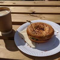 Salted caramel latte (with oat milk) and BLT bagel at Be Kind The Vegan Coffee Caravan in Hayle