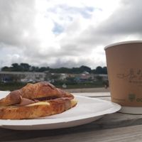 Pumpkin spiced latte and 'ham' & cheeze filled croissant - perfect Sunday brunch! at Be Kind The Vegan Coffee Caravan in Hayle