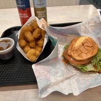 Buffalo chicken sandwich with tater tots  at V Burger in Calgary