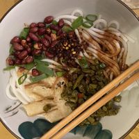 Rice noodles with seitan, peanuts, spicy sour beans  at Su Guan in Florence