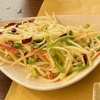 Shredded stir-fried potatoes with vinegar, garlic and chilli. Simple but delicious.  at Su Guan in Florence