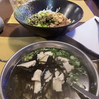 Seaweed soup with tofu and rice noodles with seitan and pickled asparagus. very good!  at Su Guan in Florence
