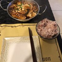 hot pot and side of rice  at Su Guan in Florence