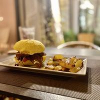Saffron bun with seitan, red radish and caramelized onions at Ciotolina Rivendita e Cucina in Cesenatico
