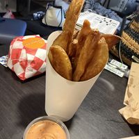 Delicious potato wedges and vegan sauce !  at NICE Biscuit in Syracuse