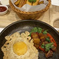 Crispy pork in basil with vegan egg  at The Vegano Bistro in Chiang Mai
