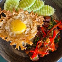 Crispy pork, vegan fried egg at The Vegano Bistro in Chiang Mai
