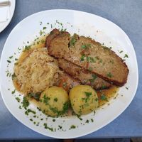 Caraway roast with sweet sauerkraut and potato dumplings at Velani in Vienna