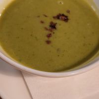 Erbsen Minz Suppe mit Speckwürfeln at Velani in Vienna