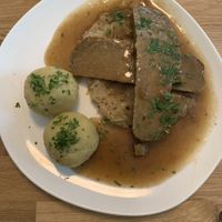 Caraway roast with sweet sauerkraut and potato dumplings  at Velani in Vienna