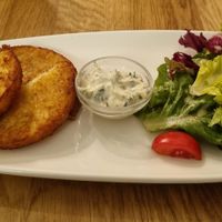 Viennese potato pancakes with herb butter and salad (8,80€) at Velani in Vienna