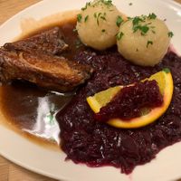 “Vegansl” - vegan goose with red cabbage and potato dumplings (amazing texture and taste!)  at Velani in Vienna