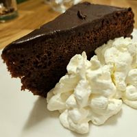 Sachertorte with whipped cream at Velani in Vienna