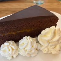 Sacher torte with delicious cream at Velani in Vienna