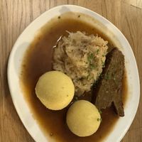Kümmelbraten mit Süßkraut und Erdäpfelknödel  at Velani in Vienna