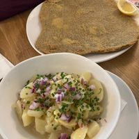 Schnitzel and potato salad at Velani in Vienna