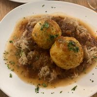 Greave dumplings (grammelknödel mit sauerkraut) at Velani in Vienna