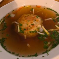 Vegetable broth with cheese dumpling at Velani in Vienna