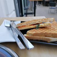 Vegan toast with tomato, fresh basil and vegan cheese.  at Cuenstler in Bregenz