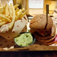 Burger with fries and guacamole dip. at Burgerheart in Ingolstadt