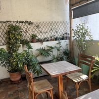 Seating on the terrace   at Maha Vegan Food in Bogota