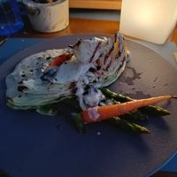 Cabbage steak with mushroom sauce, asparagus and carrots at Oniro By The Sea in Paphos