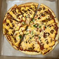 Vegan pizzaa  at Loving Hut in Surabaya