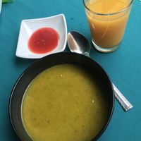 Soup, juice and a small desert that come with the meal of the day   at Govindas in Manizales