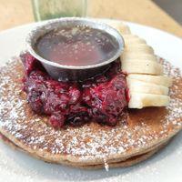 Vegan pancakes with red fruit jam and maple syrup at Kitchen Paris in Paris