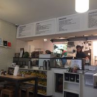 Menu and inside of restaurant (not sure how up to date this menu is, they hand you a laminated one when you sit down) at Kitchen Paris in Paris