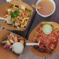 BBQ poutine, tofu kebab, Machurani balls with fried rice and hot sauce(0.50cent extra), hot apple cider at Sweet Po Vegan Eats in Toronto