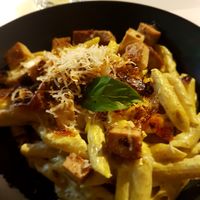 Carbonara pasta with tofu at BioMania Bistro Bol in Bol