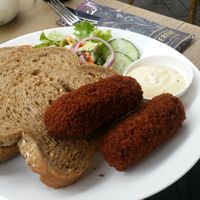 Dutch croquettes with vegan pulled meat ragout, served with brown bread, a salad and mustard mayo.  at Suikerkist in Breda