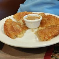 Roti stuffed with banana served with caramel sauce at Aroy Thai Gardens in Middletown