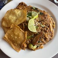 Tom yum noodles with rice noodles, no soup and added chicken  at Aroy Thai Gardens in Middletown