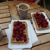 Black coffee, vegan waffles with hot cherries at Peters Waffelbar in Prerow